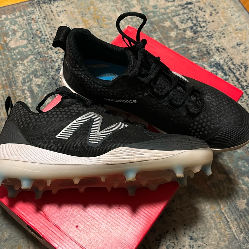Black New balance cleats